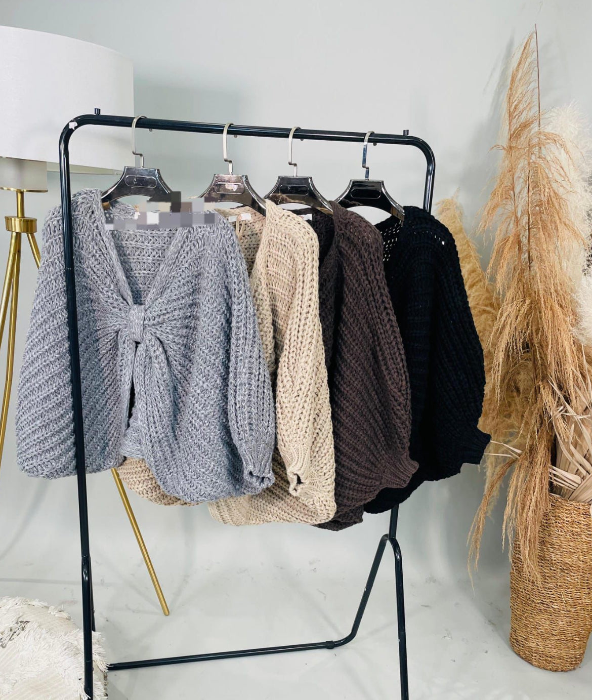 Large knitted bow jumpers