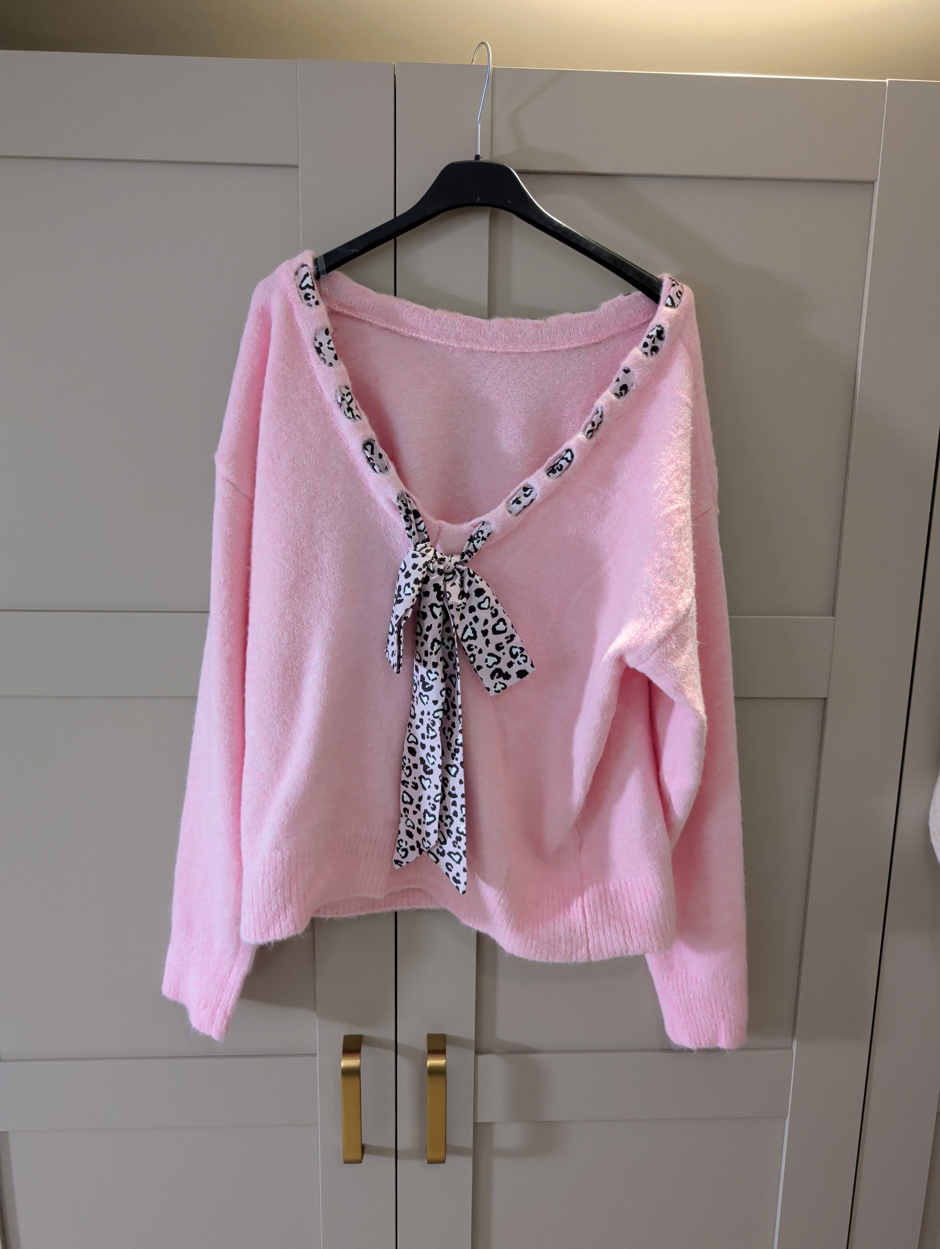 Leopard print bow jumper