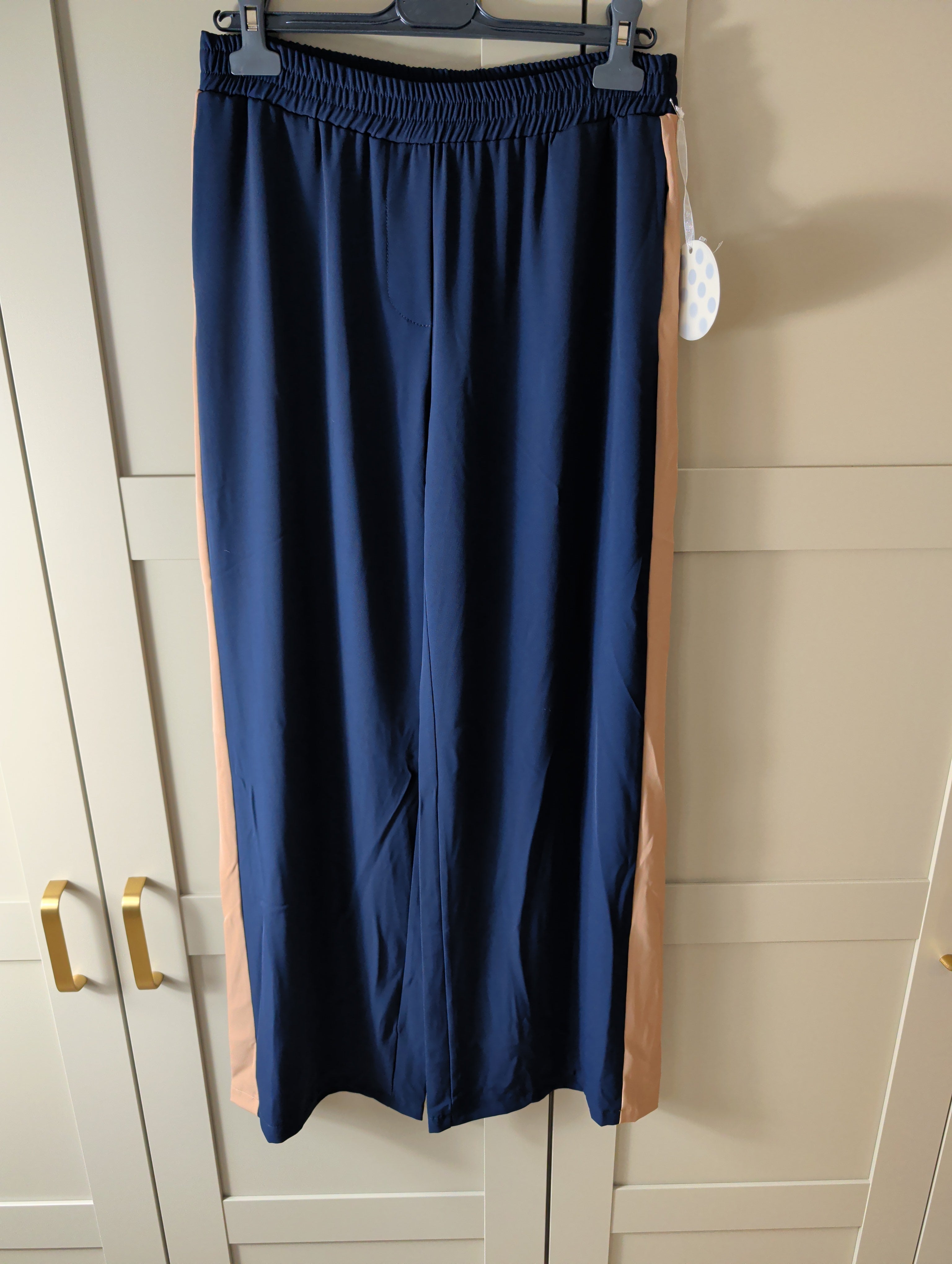 Wide leg trousers in blue with tan stripe